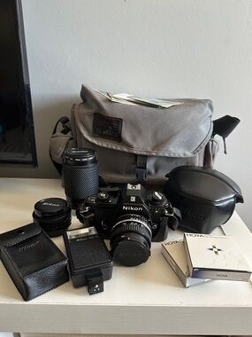 Vintage ‘93 Nikon EM 35mm Film Camera with 3 Lenses & Accessories